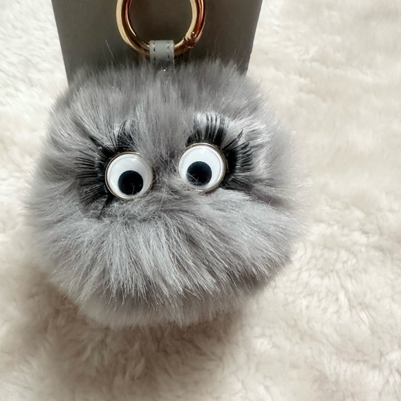Next Direct Accessories - Gray Eyed Fluffy Ball Key Ring